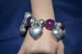 Bracelet élastique pampilles avec perles prune.